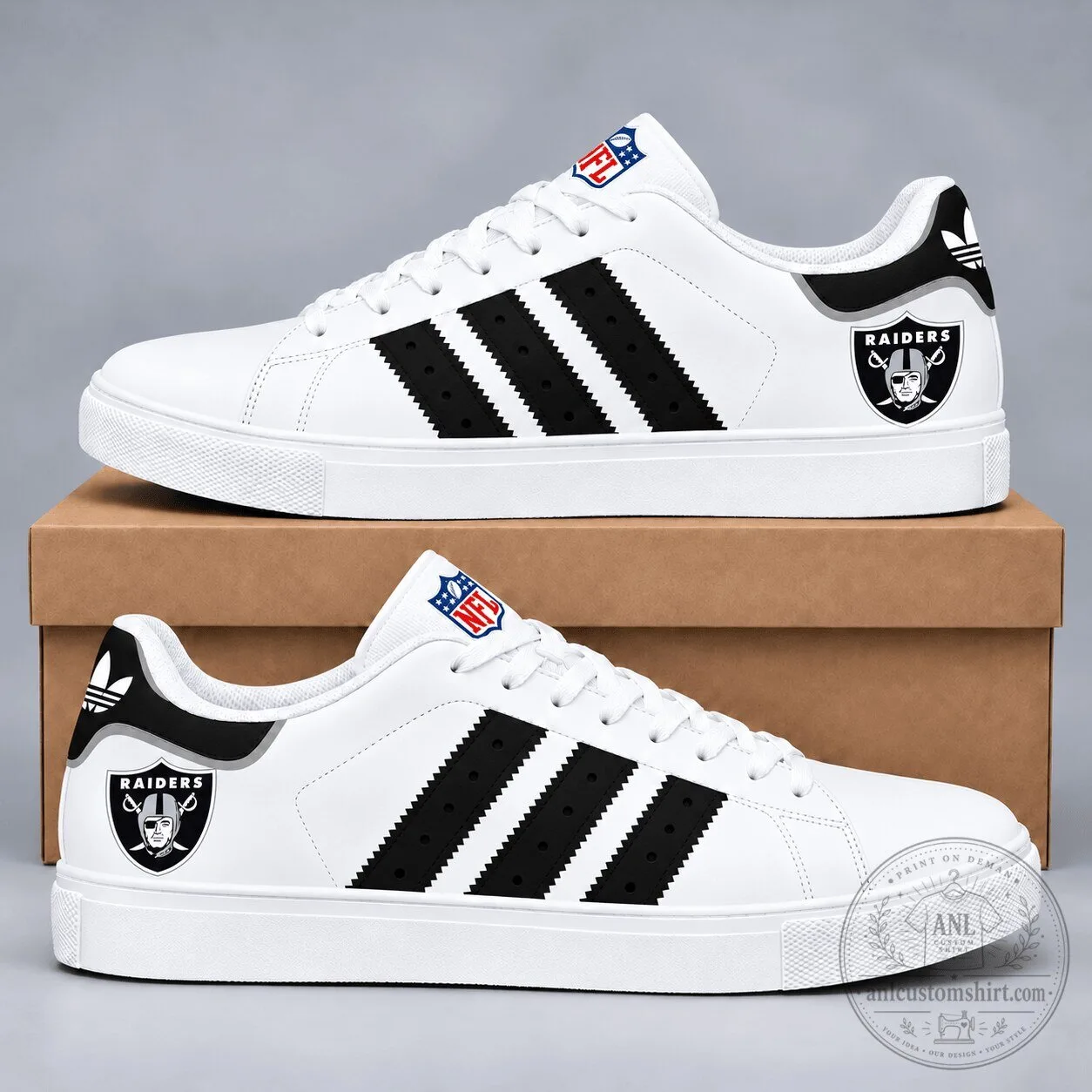 White and Black Stripe Sneakers featuring the Las Vegas Raiders NFL Team Logo